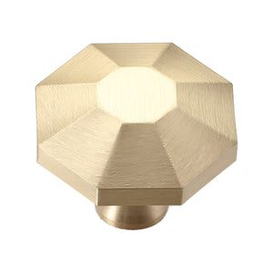 Brass-tone multi-faceted cabinet knob with a small flat center, option No. 1.