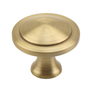 Brass-tone round cabinet knob with a recessed circular center, option No. 6.