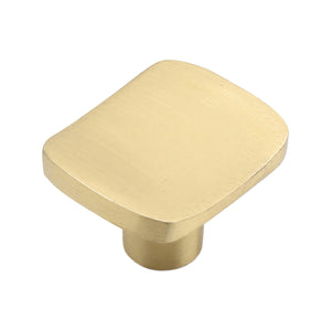 Brass-tone rounded square cabinet knob with a flat face, option No. 3.