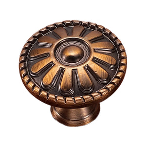 Bronze-tone round cabinet knob with a raised radial floral face, option No. 1.
