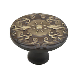 Bronze-tone round cabinet knob with raised scrollwork and a sun motif, option No. 6, 32 mm.