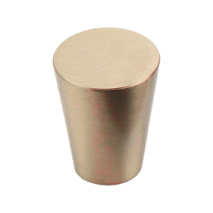 Brushed gold cylindrical cabinet knob with a flat top, option No. 3.