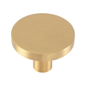 Brushed gold-tone flat disc cabinet knob on a cylindrical stem, option No. 6, 32 mm.
