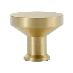 Large brushed gold-tone flat round cabinet knob, option No. 1.