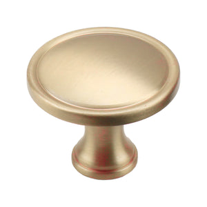 Brushed gold round cabinet knob with a shallow dished face, option No. 1.