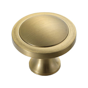 Brushed gold round cabinet knob with a recessed center, option No. 5.