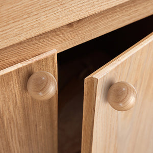 In-use view of beech wood ball cabinet knob, 35 mm option.
