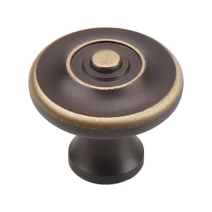 Coffee-brown round cabinet knob with a raised center and gold-tone rim, option No. 2.