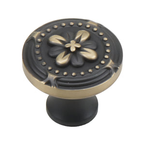 Coffee brown round cabinet knob with a gold-tone floral face, option No. 1.