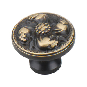 Dark antique-tone round cabinet knob with gold-tone floral relief, option No. 3.