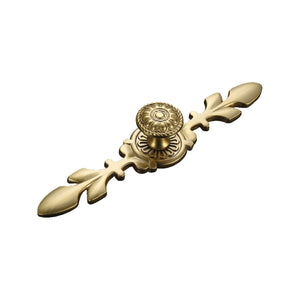 Ornate gold-tone cabinet knob with a central floral medallion and leaf-shaped ends, option #5.