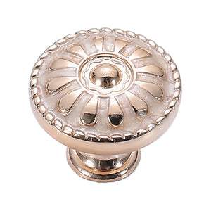 Light rose-gold-colored floral cabinet knob with a raised petal design, variant #2.