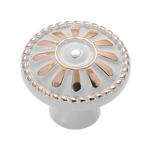 Pale metallic floral cabinet knob with a raised petal design, variant #7.