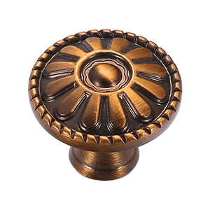 Copper-colored floral cabinet knob with a raised petal design, variant #8.