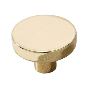 Gold-tone round cabinet knob with a flat top, 35 mm.