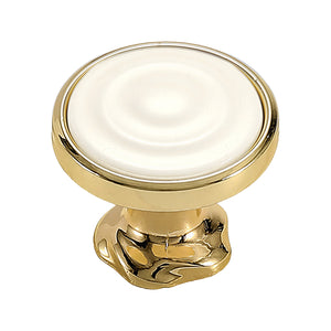 Gold-tone round cabinet knob with a white ceramic face and sculpted base, option No. 8.