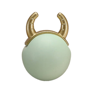 Green round cabinet knob with brass-tone horn detail, option No. 3.