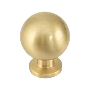 Matte gold-tone smooth spherical cabinet knob, option No. 1.