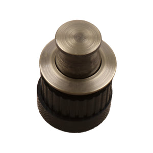 Old bronze-tone round pop-up cabinet knob with a flat top and dark ribbed base, option No. 3.