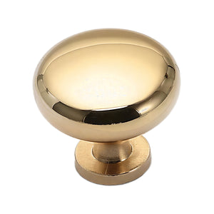 Polished gold-tone round cabinet knob, option No. 1.