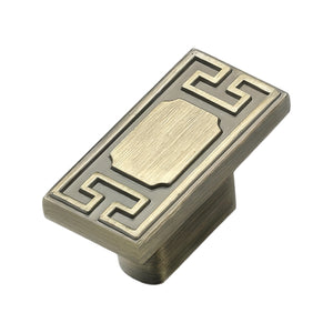 Bronze-colored rectangular cabinet knob with a geometric border, variant #11.