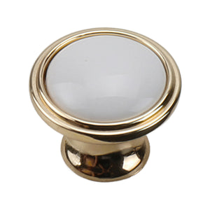 Round white ceramic cabinet knob with a gold-tone rim, option No. 1, 37 mm.