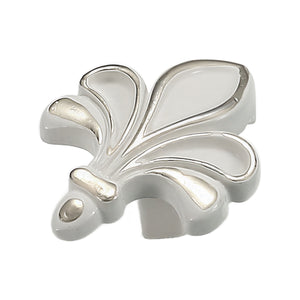 White and silver-tone fleur-de-lis cabinet knob with raised leaf-shaped petals, option No. 5.