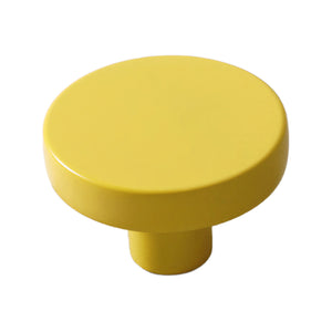 Yellow round cabinet knob with a flat top, 35 mm.