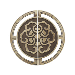Antique bronze-tone circular cabinet pull with a floral center, 64 mm, option No. 5.