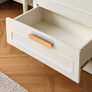 In-use view of slim rounded beech wood finger pull, 64 mm option.