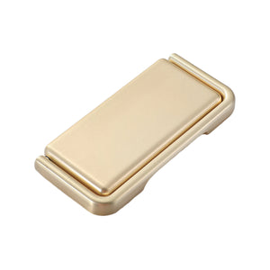 Gold-tone rectangular folding pull with a raised center panel, 83 mm.