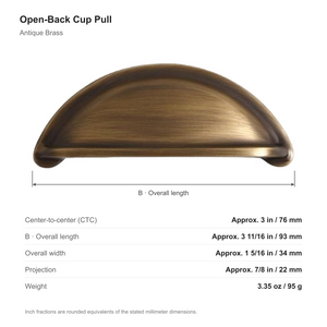 Dimensions of the open-back cup pull in Antique Brass: 76 mm center-to-center, 93 mm long, 34 mm wide and 22 mm projection.