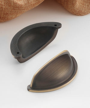 Front and rear views of the solid brass open-back cup pull in Antique Bronze, showing two rear mounting holes.