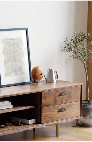 Solid brass open-back cup pulls in Antique Bronze on the drawers of a wood-grain sideboard.