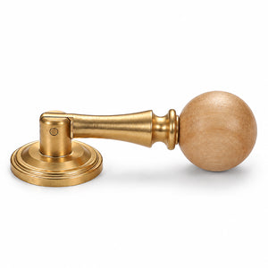 Light wood ball drop pull with a brass stem and round base, style #5.