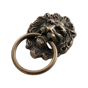 Bronze-tone lion-head ring pull with a circular drop ring, option No. 1.