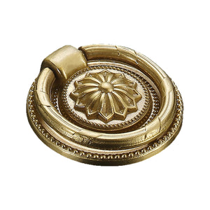 Round gold-tone ring pull with a raised floral center, option #10.