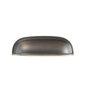 Solid brass rounded dome cup pull in Antique Bronze finish on a white background.