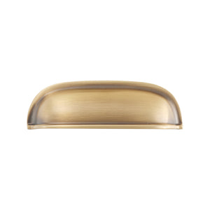 Solid brass rounded dome cup pull in Burnished Brass finish on a white background.