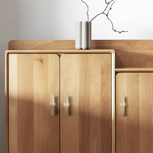In-use view of oak wood T-bar cabinet pull with a square brass center mount, style #2.