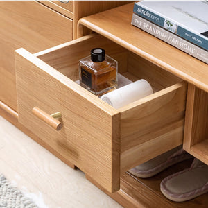 In-use view of slim beech wood T-bar cabinet pull with brass stem, style #8.
