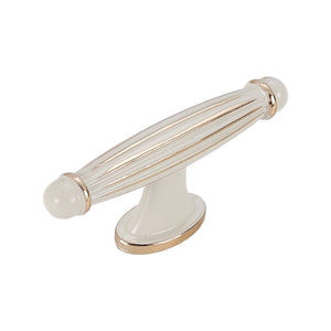 Ivory T-bar pull with a ribbed translucent bar and round base, option No. 1.