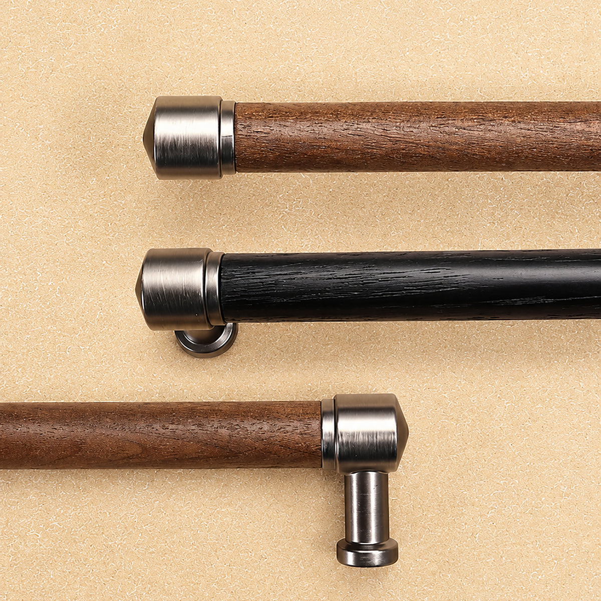 White oak, black oak and walnut bar cabinet pulls with silver-colored mounts.
