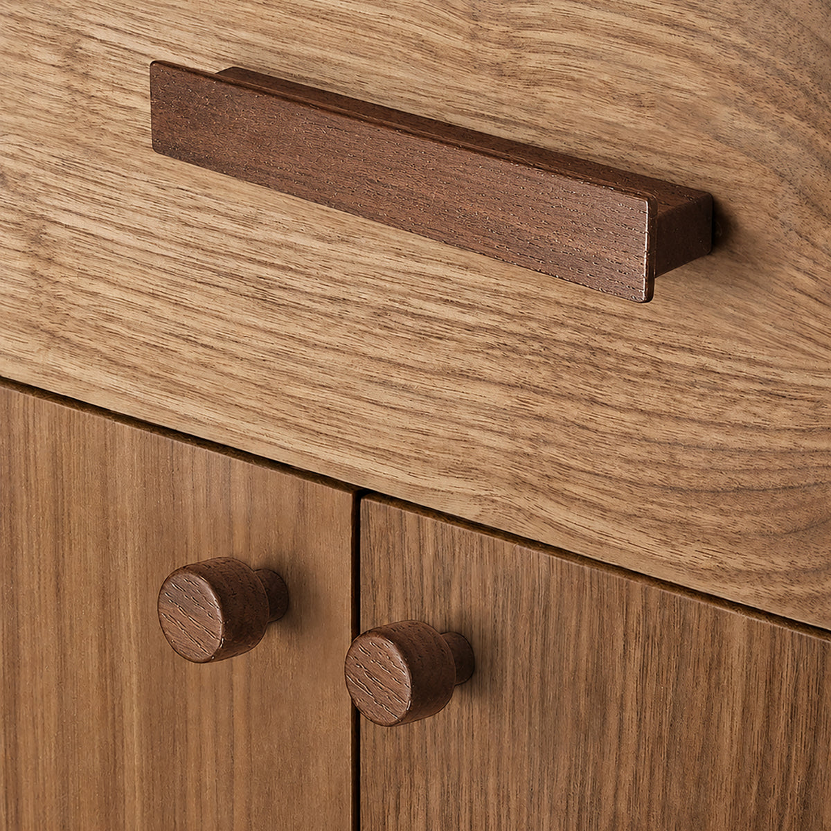 Round walnut wood cabinet knob, style #1 fitted to cabinetry.