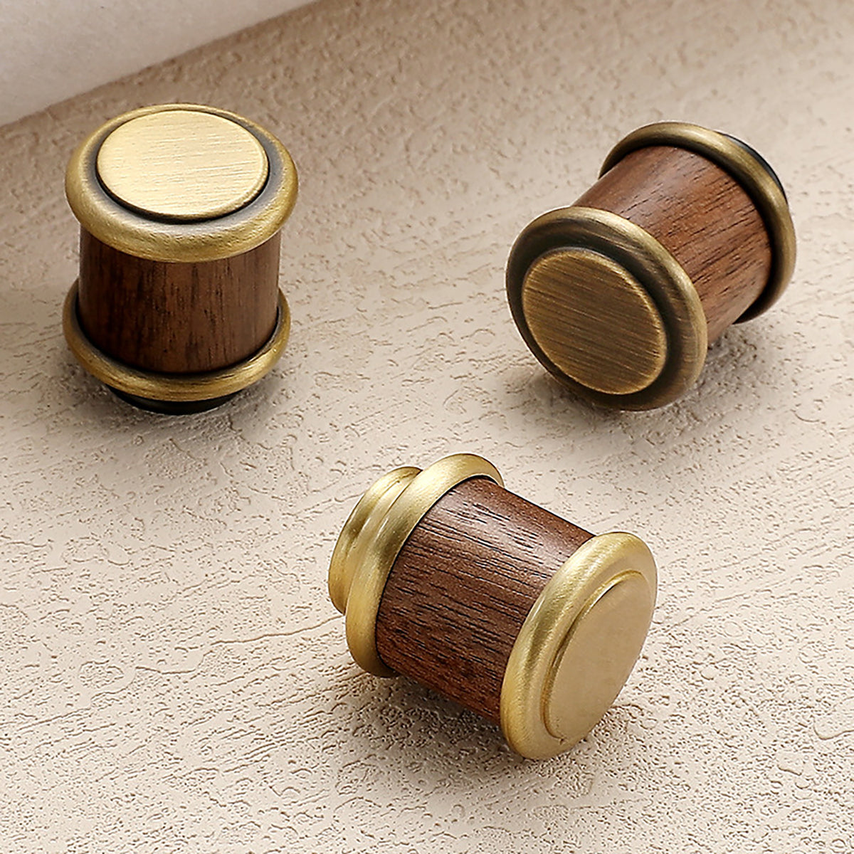 Additional view of walnut wood cylindrical cabinet knob with brushed bronze brass base, style #15.