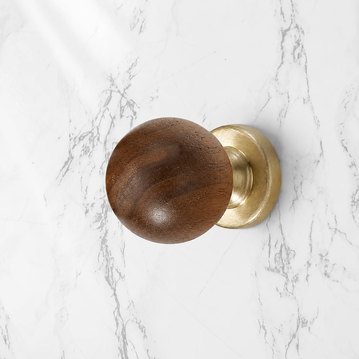 Side and mounting view of dark wood ball cabinet knob on a brass base, style #3 (30 mm).