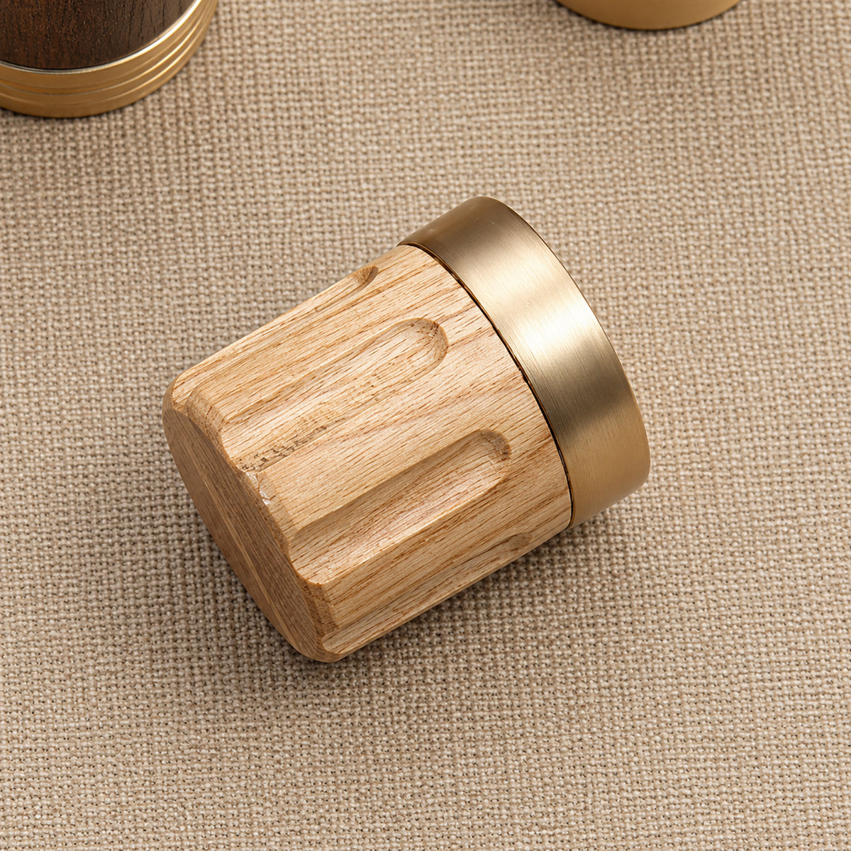 Side and mounting view of oak wood cylindrical cabinet knob with brass base, style #4 (29 mm).