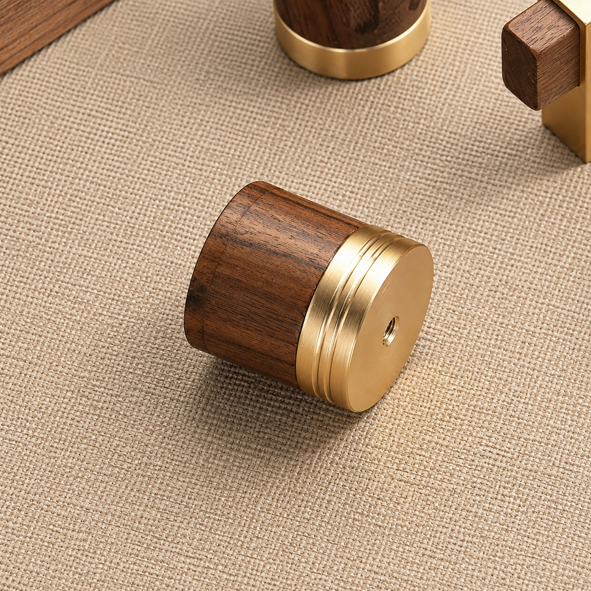 Side and mounting view of walnut wood cylindrical cabinet knob with brass base, style #6.