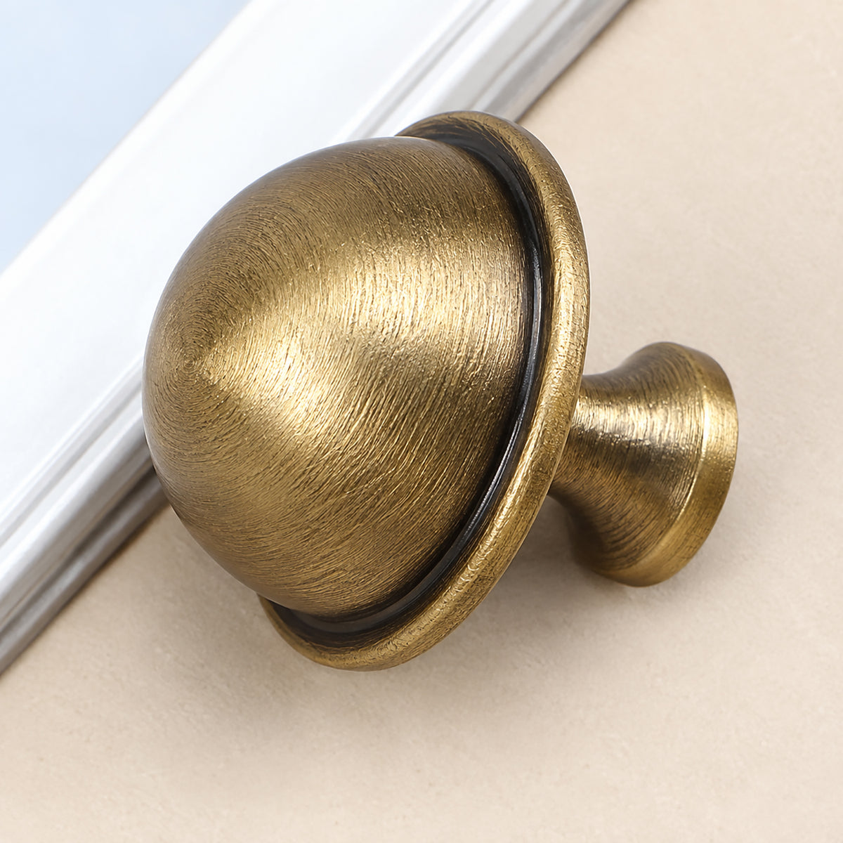 Additional view of half-dome brass cabinet knob with brushed bronze finish, style #7.