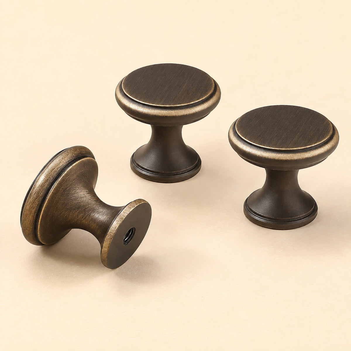 Additional angle of bronze-finish solid brass round cabinet knob, style #8.